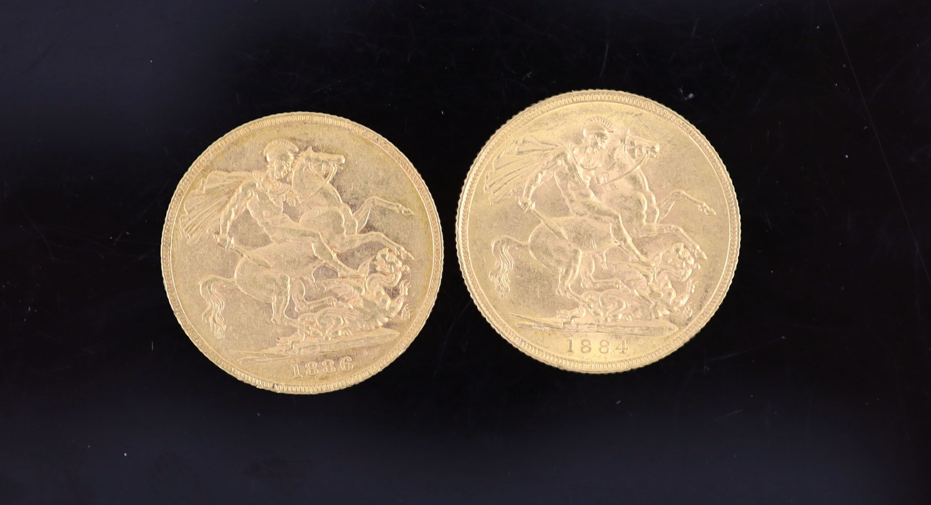 Two Victoria gold sovereigns, 1884S, VF and 1886M, NVF